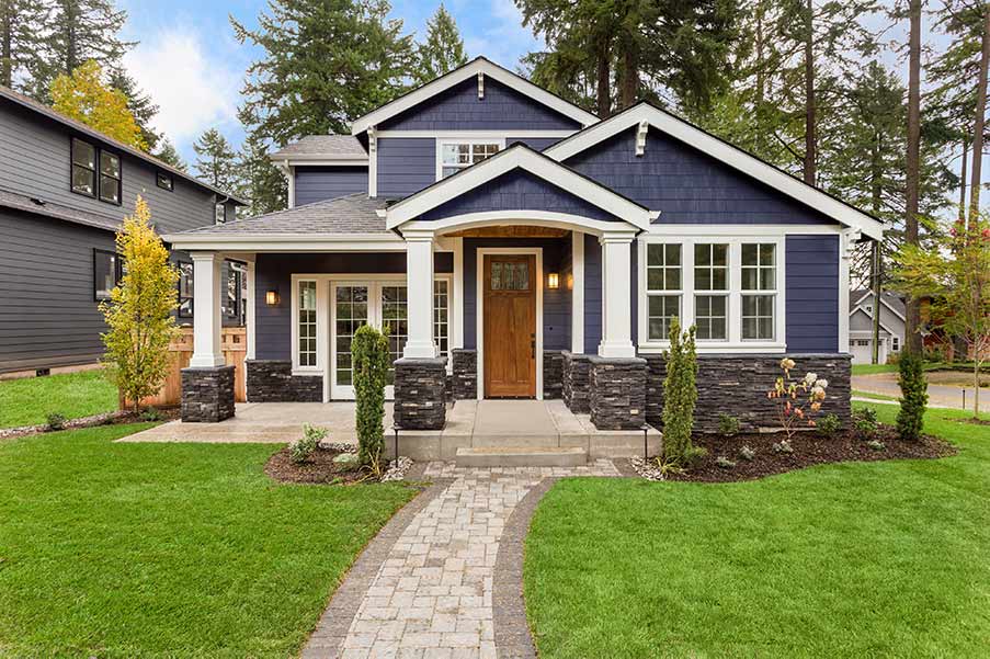 A two story blue home located in Phoenix, Oregon.